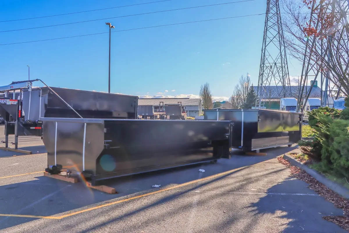 Roll-off dumpster ready for waste disposal at job site for 15 Yard Dumpster Rental in Dover